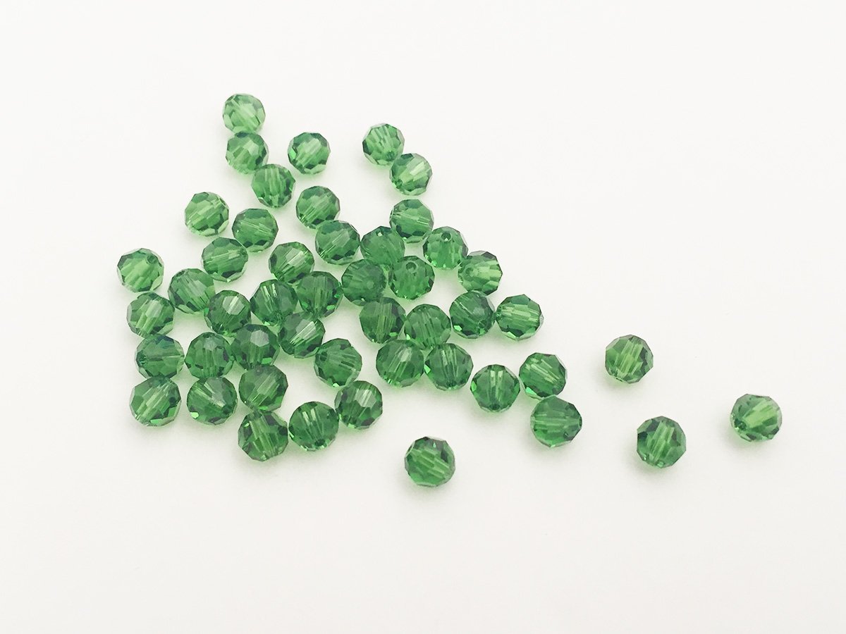 TONDO SFACCETTATO 5000 SWAROVSKI PERIDOT 6 MM